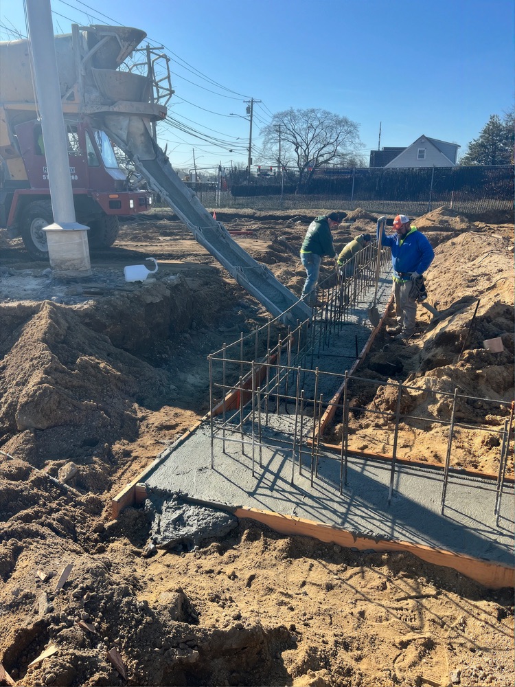Inspector reviewing structural work on a job site